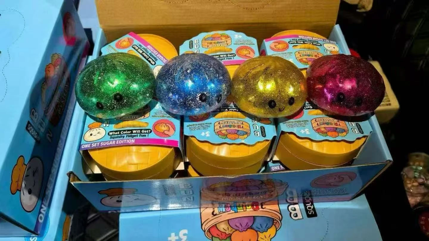 Gold glitter bead-popping bun squishy reference